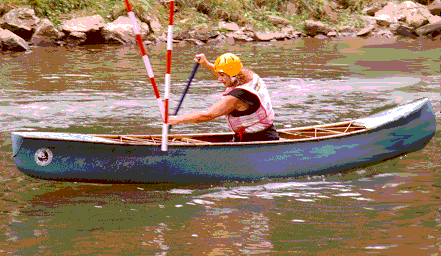 Kathy Racing a Whitewater Canoe